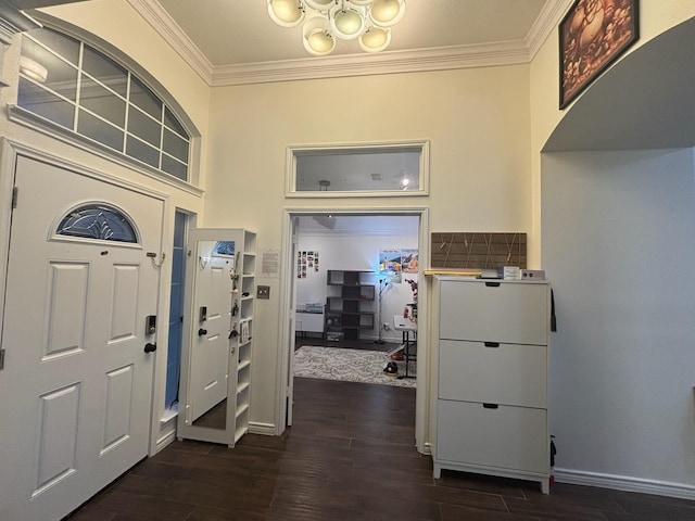 foyer entrance featuring dark hardwood / wood-style floors and ornamental molding