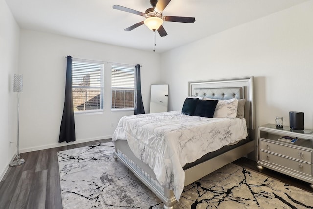 bedroom with hardwood / wood-style floors and ceiling fan