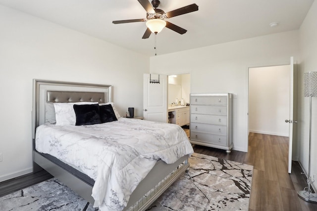 bedroom with hardwood / wood-style flooring, ceiling fan, and ensuite bathroom