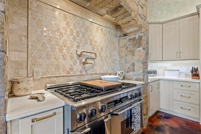 kitchen featuring tasteful backsplash and double oven range