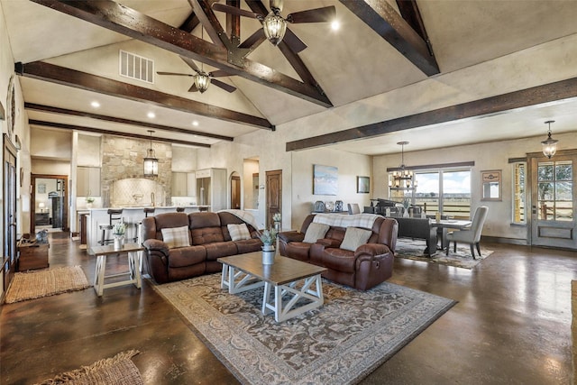 12201 Madison Ln, Justin, TX 76247 - living room with a ceiling fan, beamed ceiling, finished concrete floors, a chandelier, and high vaulted ceiling