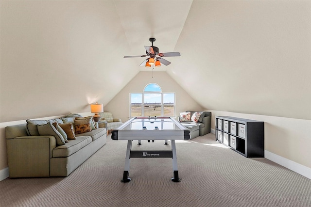 game room with ceiling fan, lofted ceiling, and light carpet