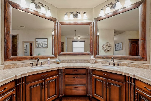 12201 Madison Ln, Justin, TX 76247 - bathroom featuring double vanity and tile patterned floors