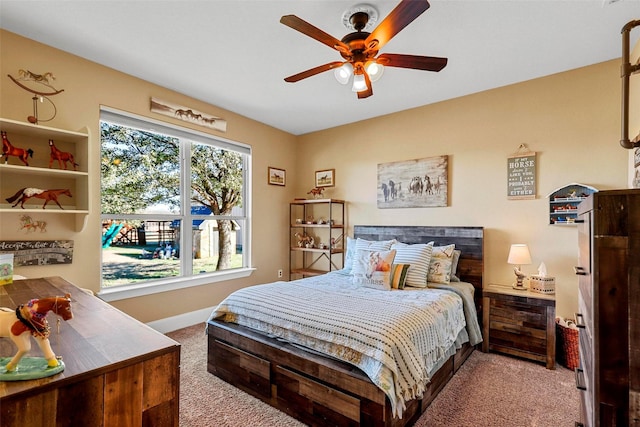 12201 Madison Ln, Justin, TX 76247 - bedroom with carpet flooring, baseboards, and ceiling fan