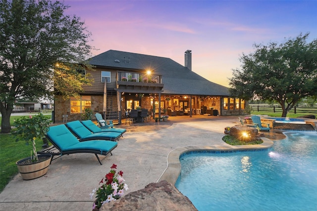 12201 Madison Ln, Justin, TX 76247 - view of pool featuring a patio, a pool with connected hot tub, and outdoor dining space