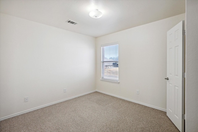 unfurnished room featuring carpet floors