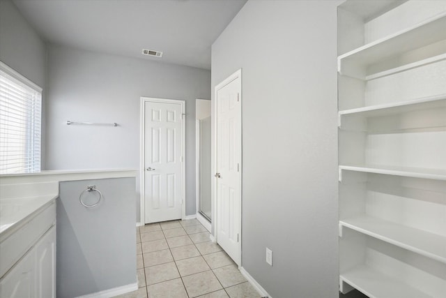 bathroom with tile patterned flooring