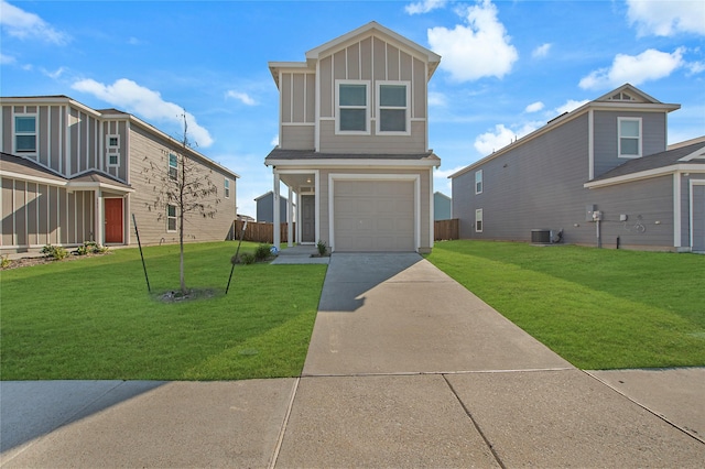 view of front property with central AC unit, a garage, and a front yard