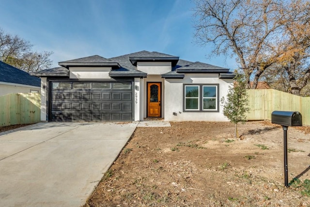 view of front of property featuring a garage