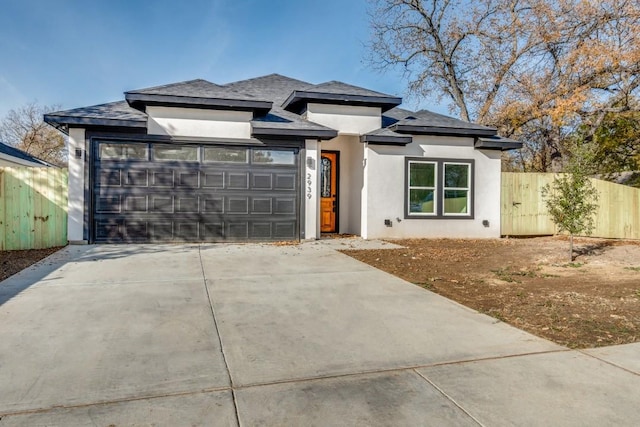 prairie-style home with a garage