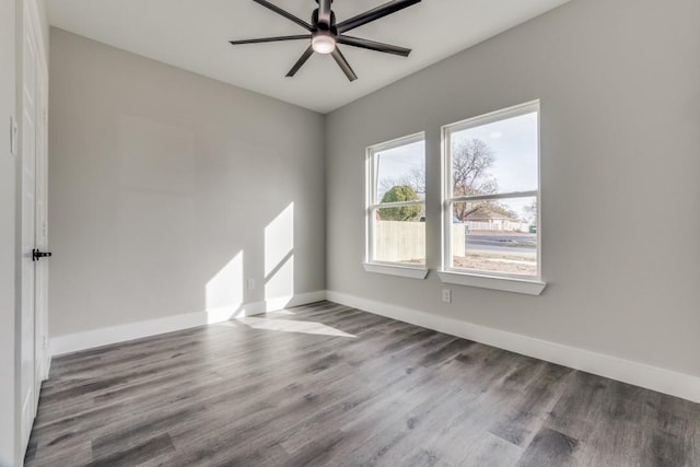 spare room featuring ceiling fan and wood-type flooring