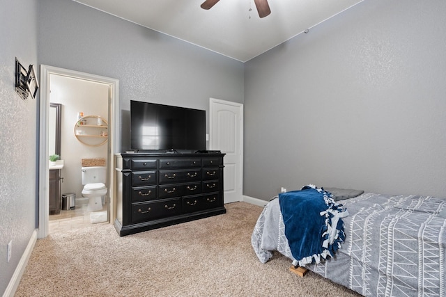 full bathroom with vanity, tiled shower / bath combo, tile patterned floors, and toilet