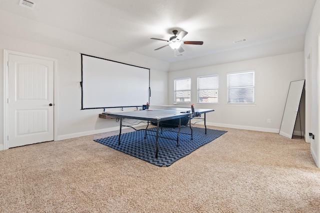 recreation room with carpet floors, visible vents, and baseboards