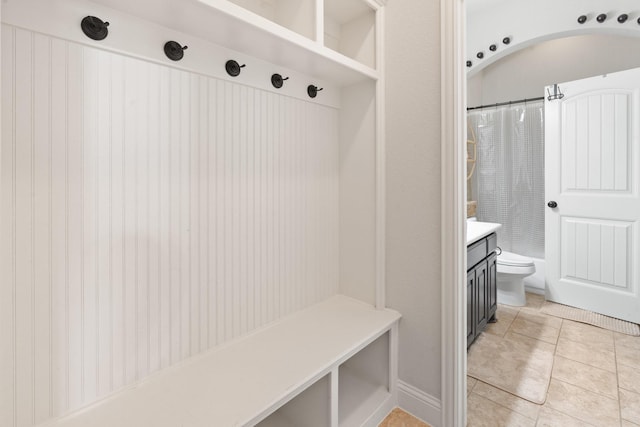 mudroom featuring light tile patterned flooring