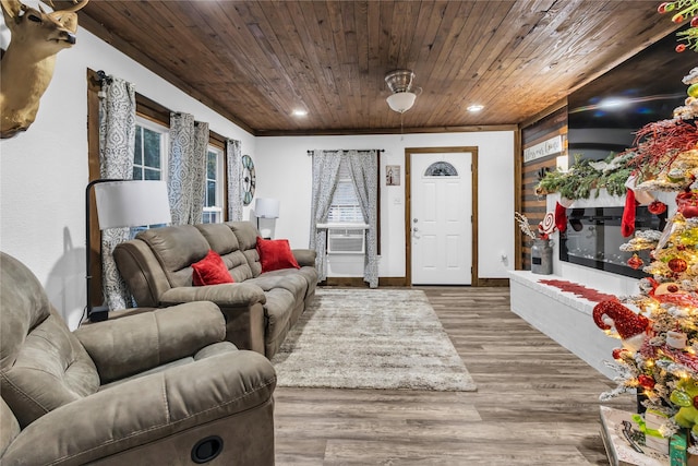 living room featuring hardwood / wood-style flooring, cooling unit, and wooden ceiling