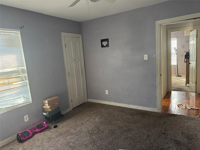 unfurnished bedroom with ceiling fan and light hardwood / wood-style flooring