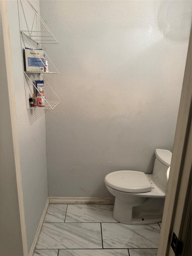 bathroom featuring toilet