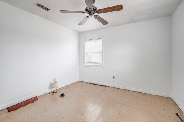 empty room featuring ceiling fan