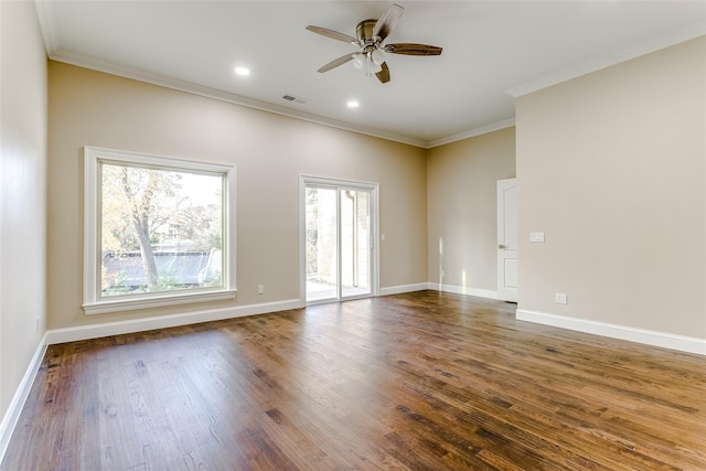 spare room featuring ceiling fan, crown molding, and dark hardwood / wood-style floors