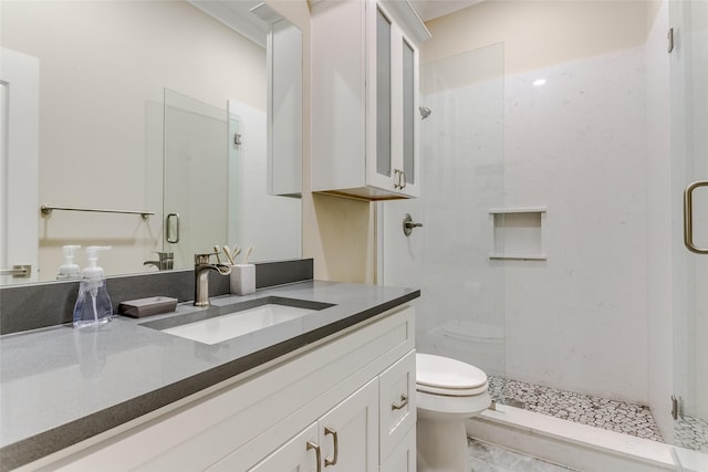 bathroom featuring vanity, toilet, and walk in shower