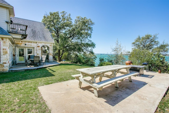 view of patio / terrace with a balcony