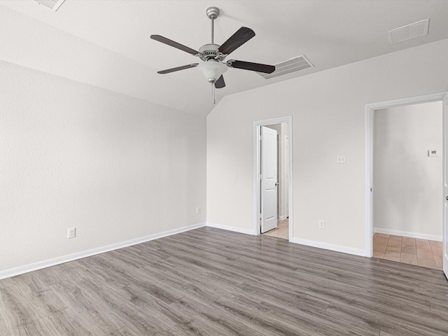 unfurnished room featuring hardwood / wood-style floors and ceiling fan