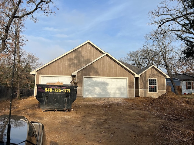 view of front of property with a garage