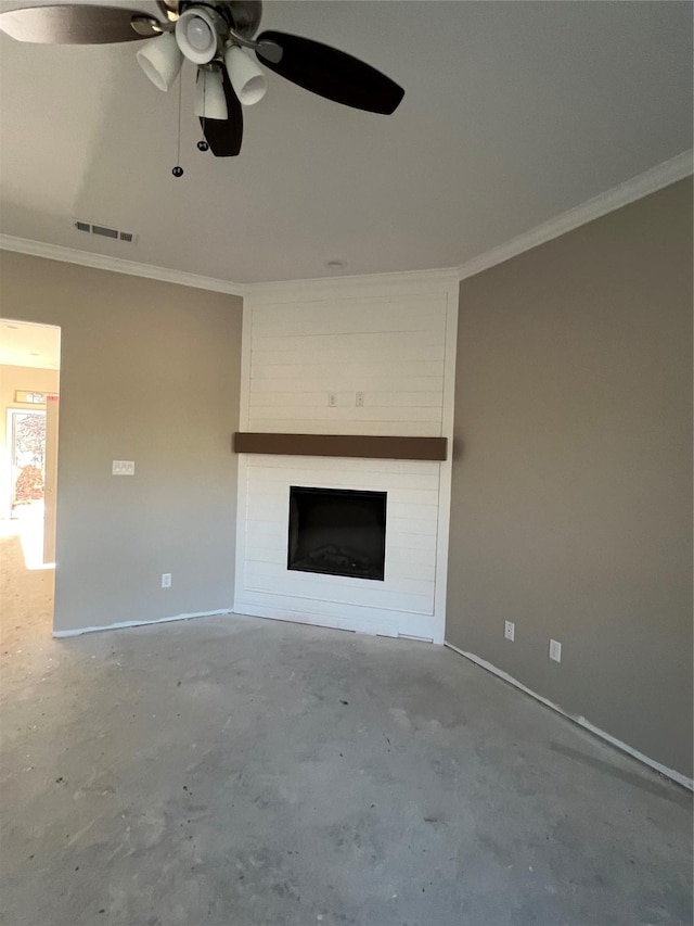 unfurnished living room featuring a large fireplace, ceiling fan, and crown molding