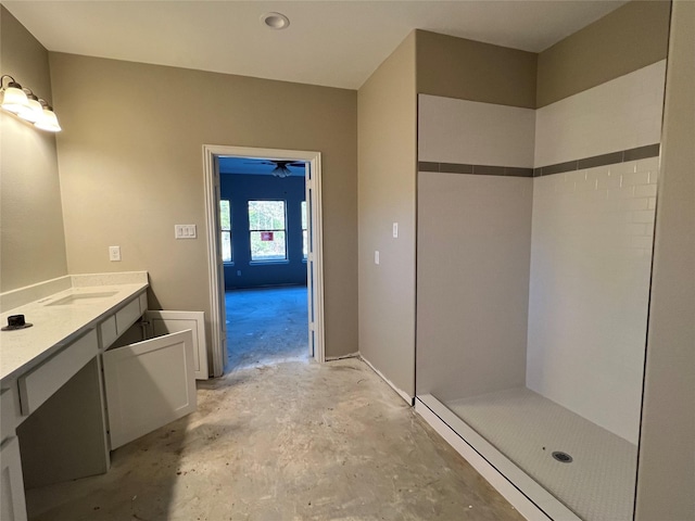 bathroom with vanity, walk in shower, and concrete floors