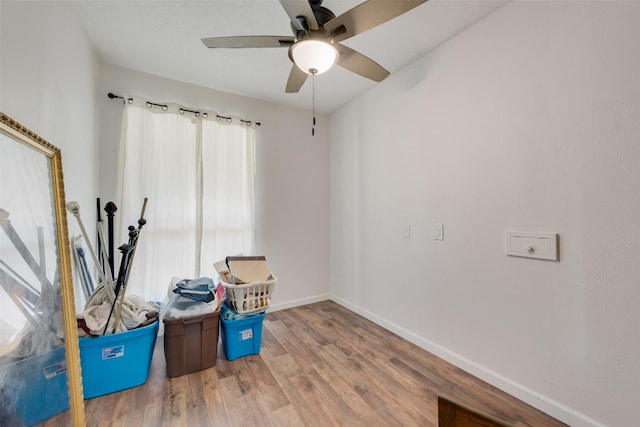 interior space featuring ceiling fan