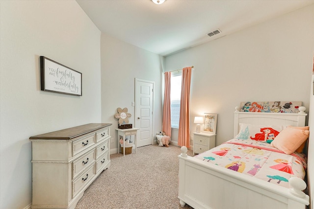 carpeted bedroom featuring vaulted ceiling