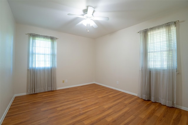 508 Squires Ln, Krugerville, TX 76227 - empty room with baseboards, a ceiling fan, and wood finished floors
