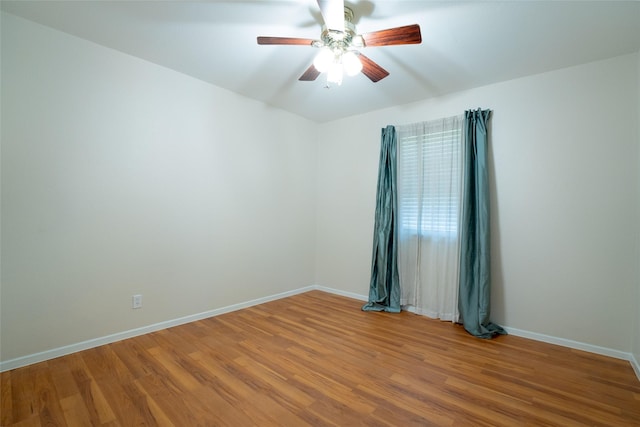 508 Squires Ln, Krugerville, TX 76227 - empty room featuring baseboards, a ceiling fan, and wood finished floors