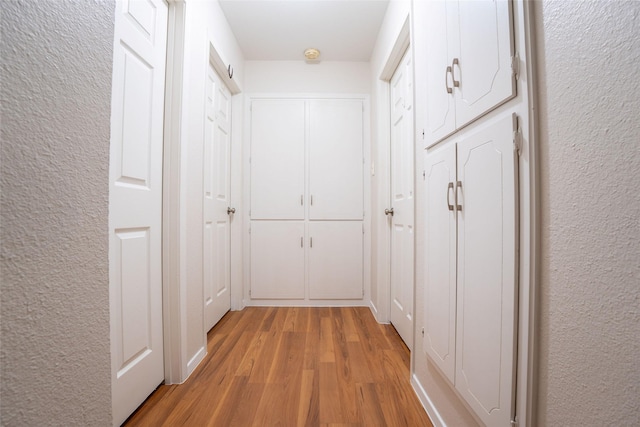 508 Squires Ln, Krugerville, TX 76227 - hall with a textured wall and light wood-style flooring