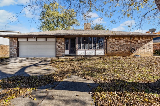 ranch-style home with a garage