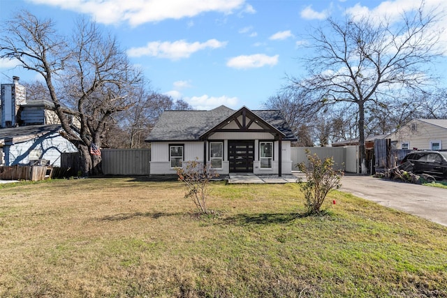 view of front of home with a front lawn