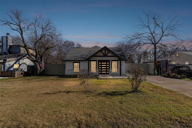 view of front of home with a lawn