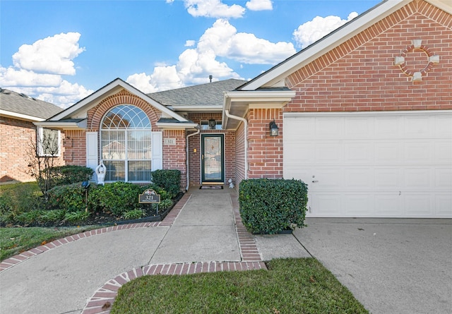 view of front of home with a garage