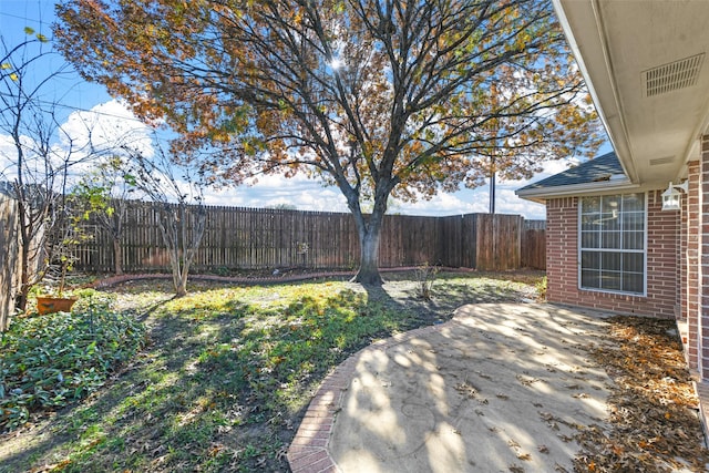 view of yard with a patio area