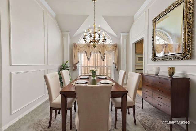 dining area featuring vaulted ceiling, light carpet, and a chandelier