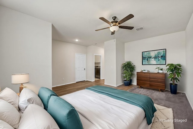 bedroom featuring wood-type flooring and ceiling fan