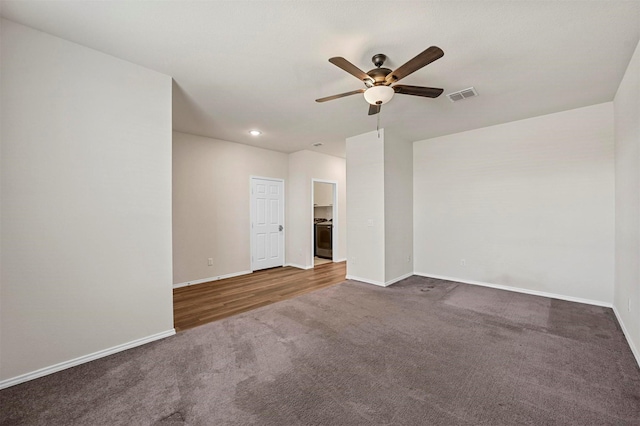 carpeted empty room with ceiling fan