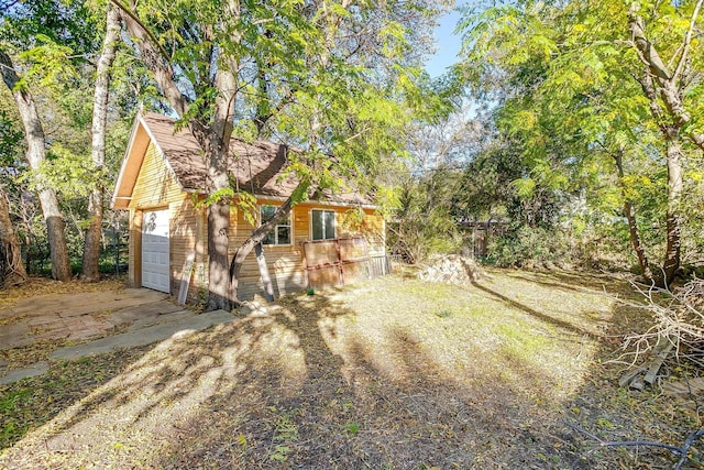 exterior space featuring a garage