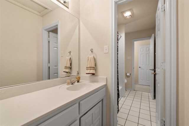 bathroom with tile patterned floors, vanity, and shower / bath combination