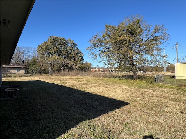 view of yard featuring central AC