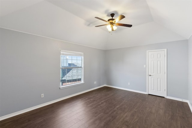 carpeted empty room with vaulted ceiling and ceiling fan