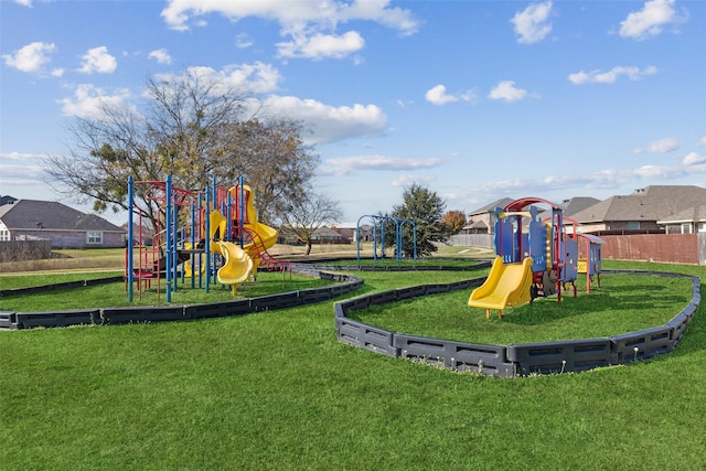 view of jungle gym featuring a yard and a community pool