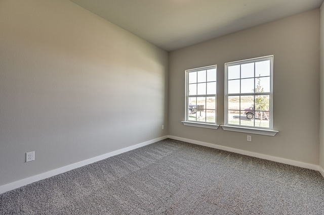 view of carpeted spare room