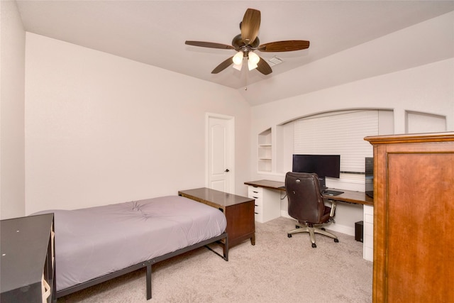 carpeted bedroom featuring lofted ceiling and ceiling fan