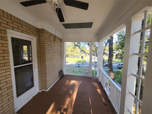 wooden terrace with a porch